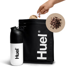 Shelf display of Huel Black Edition with eco-friendly messaging