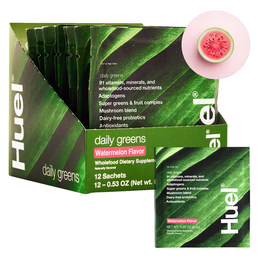 Huel Daily Greens Watermelon powder and scoop ready for a refreshing morning boost