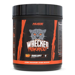 Huge Supplements Wrecked pre-workout bottle being poured for an intense training session