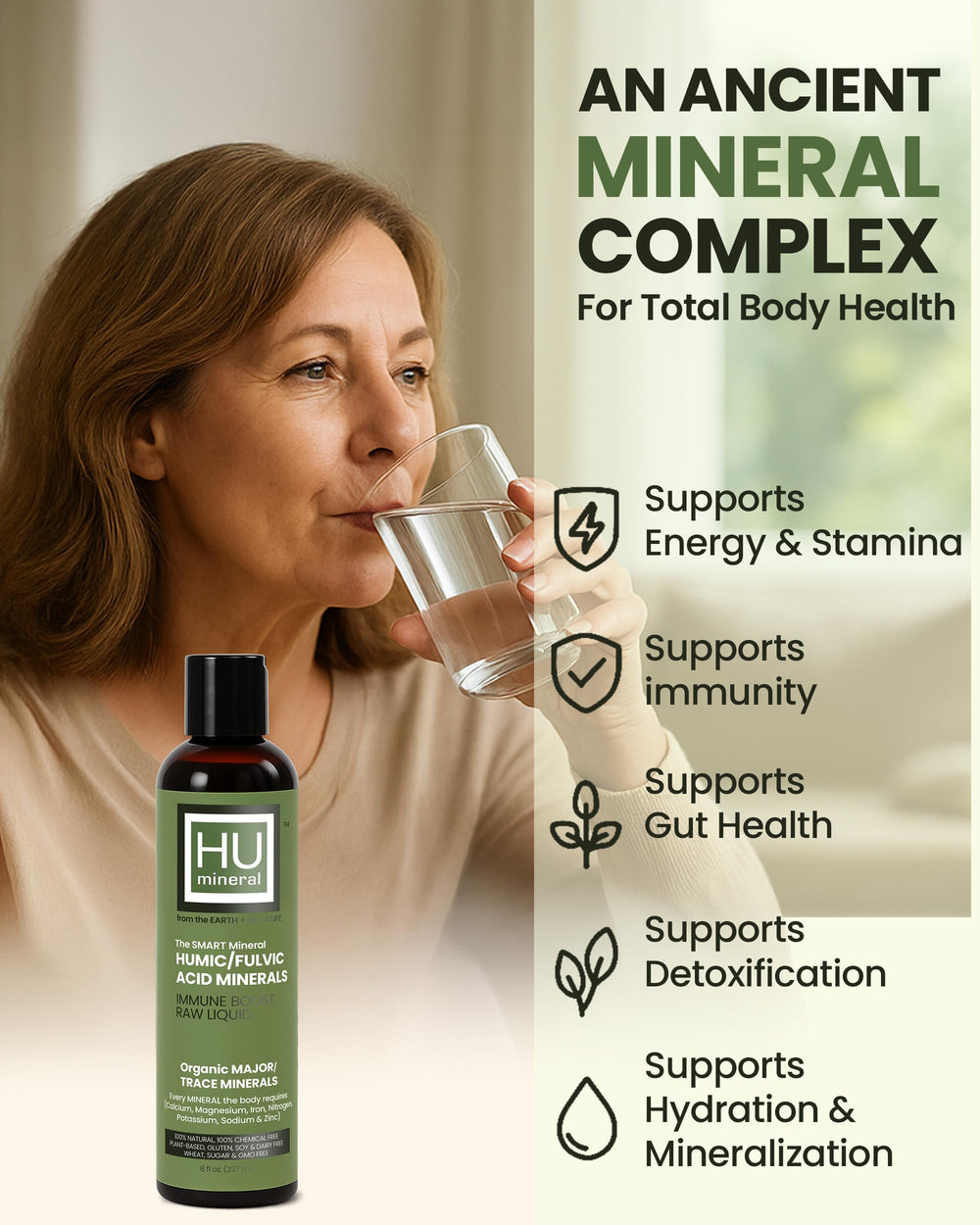 Pouring Humineral drops into smoothie for immune and gut support