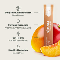On-the-go Immune Ready packets beside a laptop for busy days.