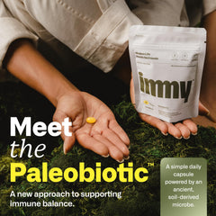 IMMY immune supplement capsules closeup highlights texture and clean ingredients.