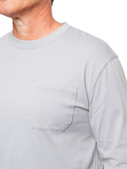 Model wearing Insect Shield pocket tee outdoors highlighting UPF 30+ protection