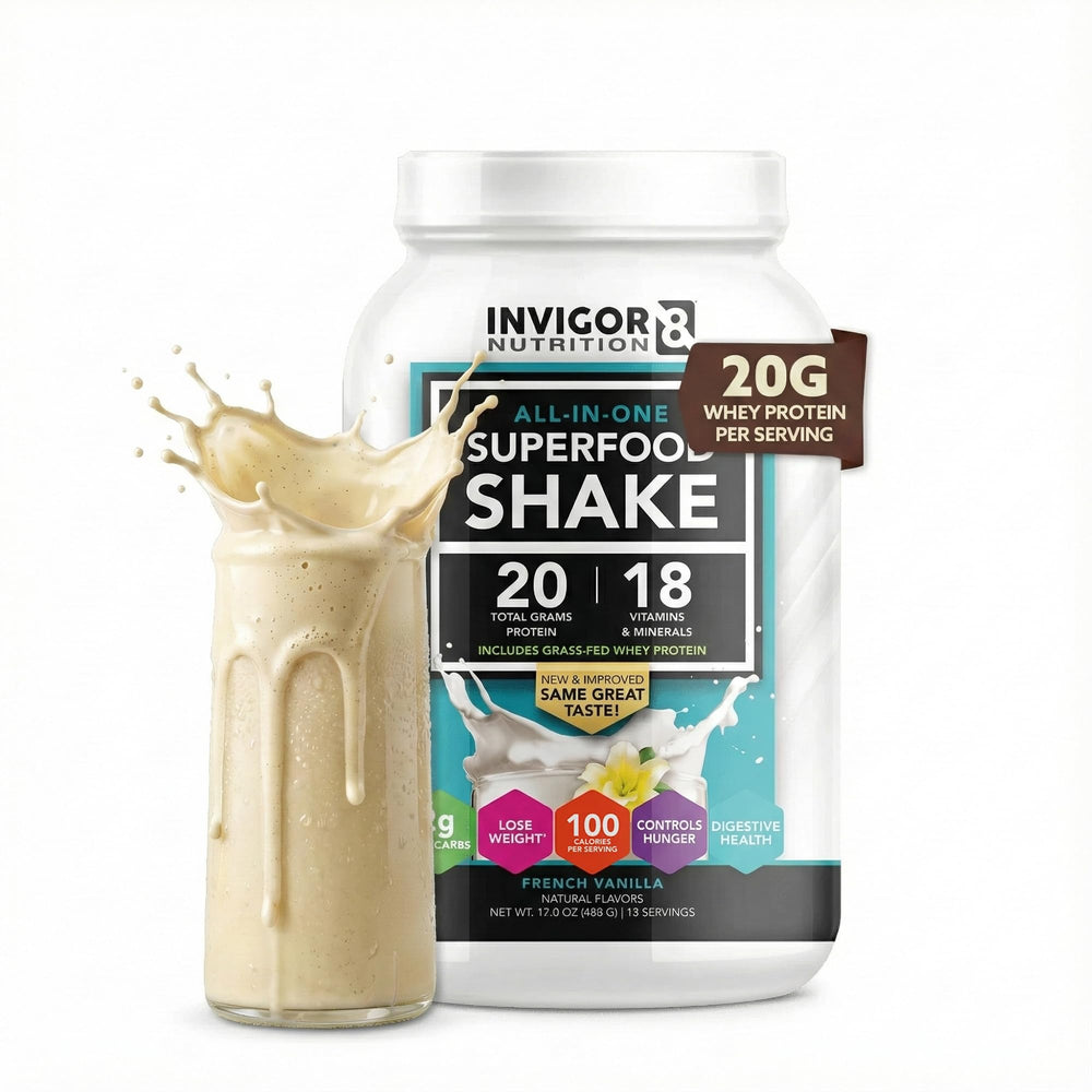 INVIGOR8 Superfood Shake vanilla in glass shows creamy texture and flavor.