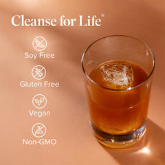 Isagenix Cleanse for Life Peach Mango being poured into water — easy daily mix for a refreshing drink