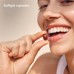 ISDIN SunISDIN capsules close-up emphasizing softgel texture and antioxidant benefits.
