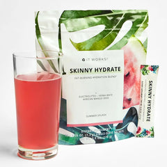 It Works Skinny Hydrate Summer Splash mix in glass ready for a post-workout refresh