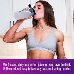 Jacked Factory Creatine for Women pouring powder into shaker for workouts