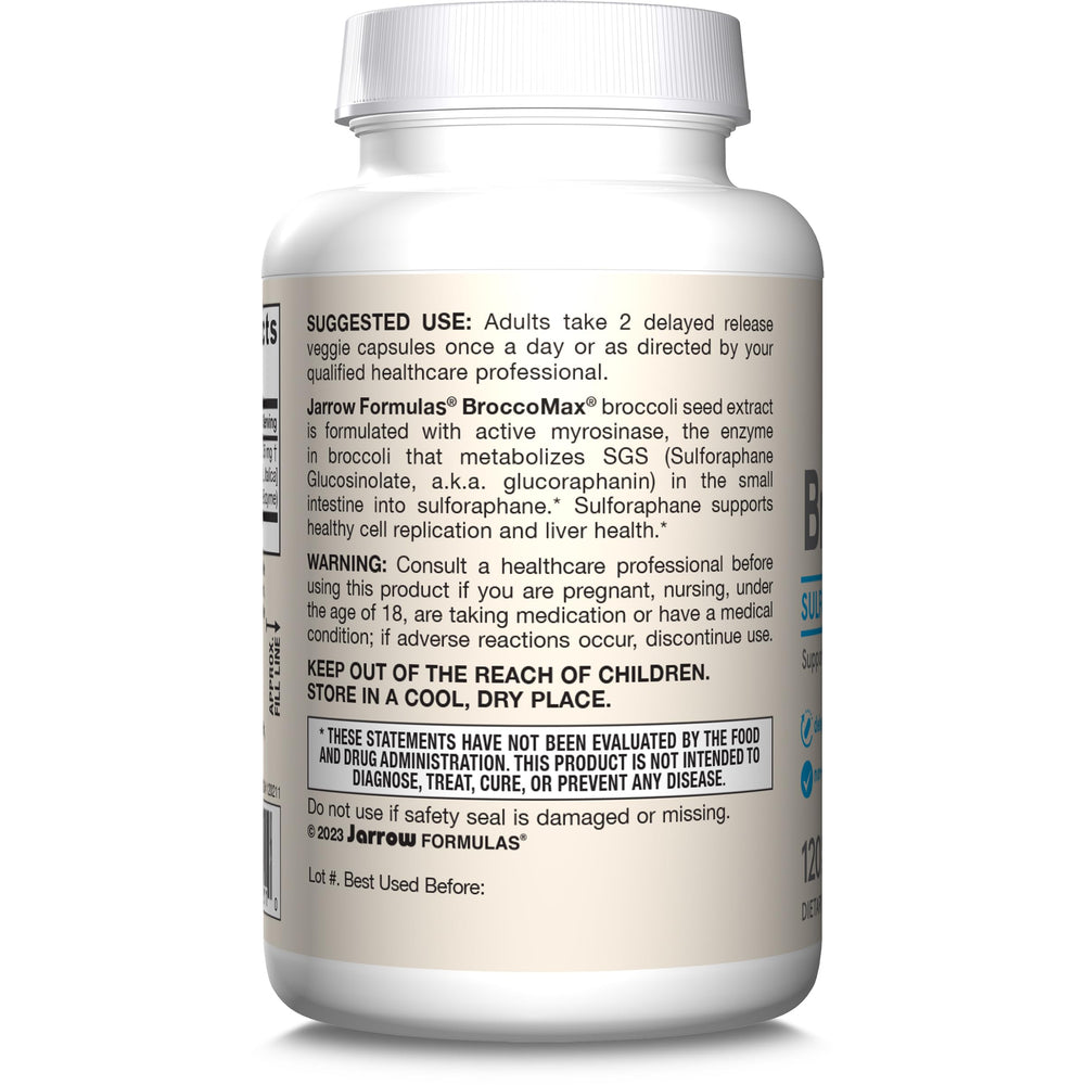 Glass of water beside BroccoMax capsules for daily liver support
