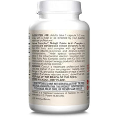 Shilajit bottle beside a meal and water for convenient consumption