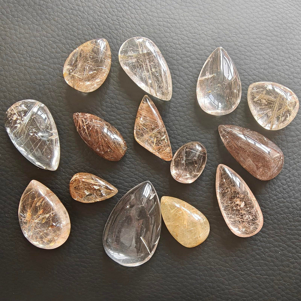 JDFlying rutilated quartz close-up highlighting gold and black rutile