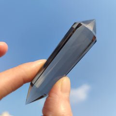 JDFlying smoky quartz base chakra tool enhancing grounding connection.