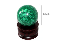 Jet International handcrafted malachite sphere highlighting artisanal precision and energy