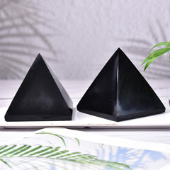 JIC Gem Black Obsidian Pyramid decor accent on a shelf.