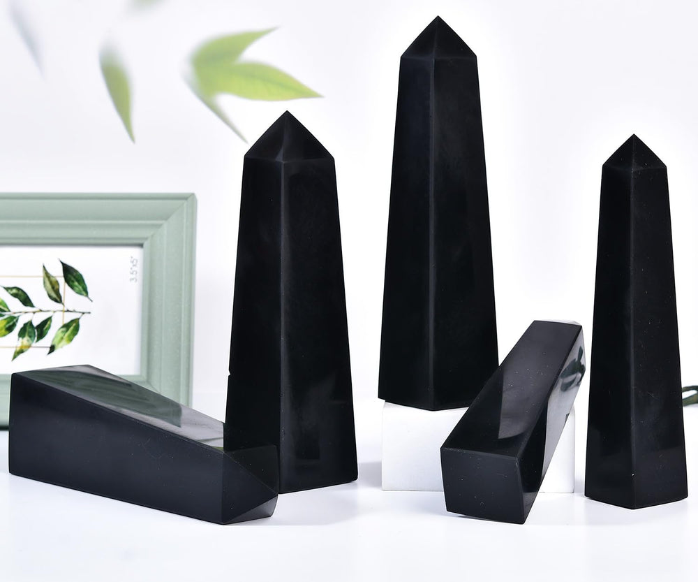 JIC Gem obsidian wand used as chic home or office decor with natural beauty.