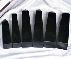 JIC Gem obsidian crystal point used for meditation and focus.