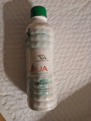Jinja Herbal Extract poured into glass, ready to refresh