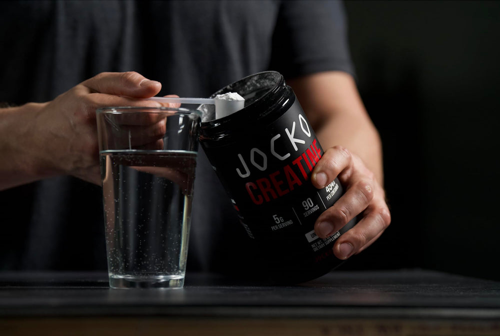 Jocko Fuel Creatine Monohydrate powder dissolving in water for quick mix