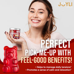 Serving setup with JOYLI Ashwagandha gummies and a glass of water