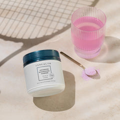 JSHealth Advanced Magnesium+ powder stirred in a glass to create a refreshing relaxation drink