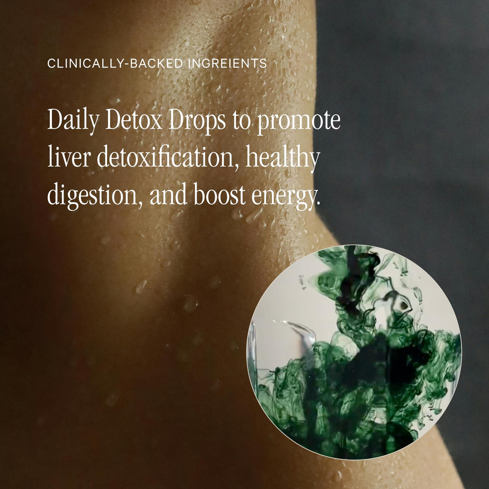 Pouring Juna Chlorophyll Drops into water for a refreshing daily ritual.
