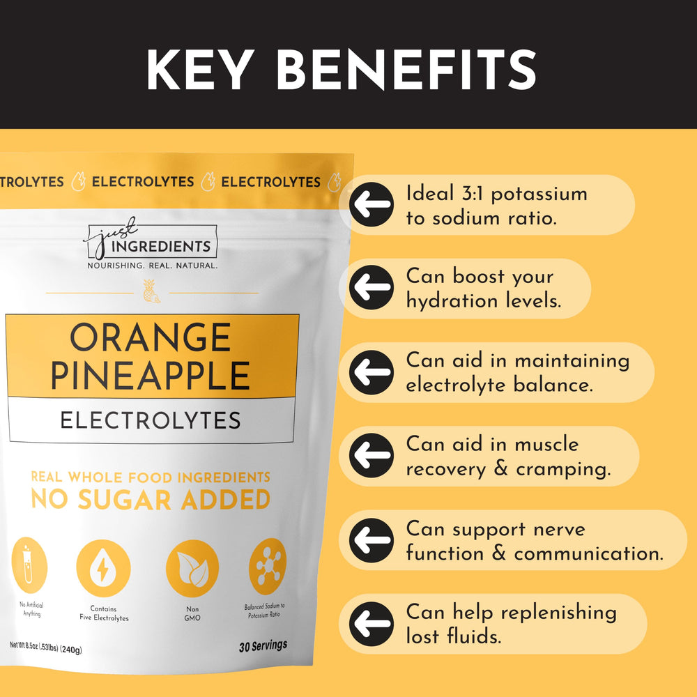 JUST INGREDIENTS Orange Pineapple Electrolytes glass served with ice for refreshing daily hydration.