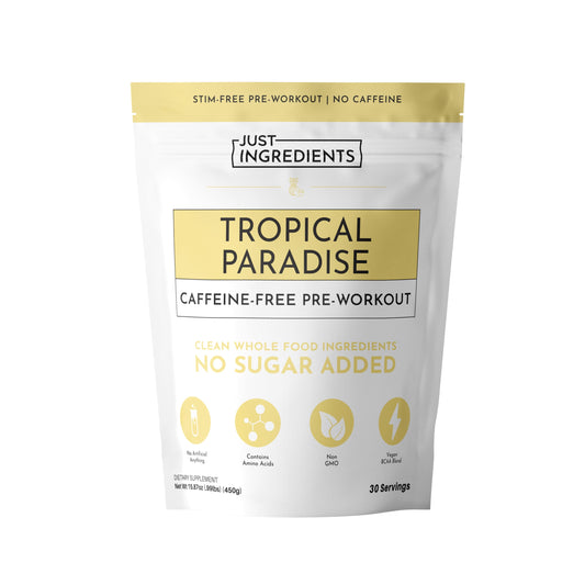 JUST INGREDIENTS Tropical Paradise pre-workout bottle showing caffeine-free energy for late-day workouts.