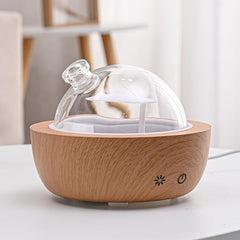 Kakoda 200ml glass diffuser with wood base for ambient scenting in living room