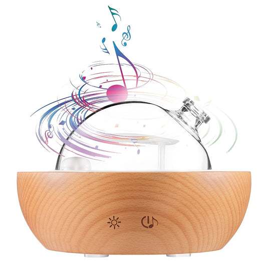 Kakoda diffuser with real wood base and mist outlet for ambient fragrance.