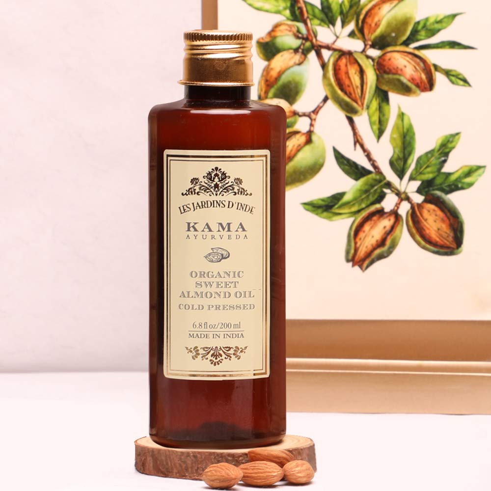 Kama Ayurveda almond oil pour close-up for daily facial care and hydration