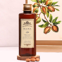Kama Ayurveda almond oil pour close-up for daily facial care and hydration