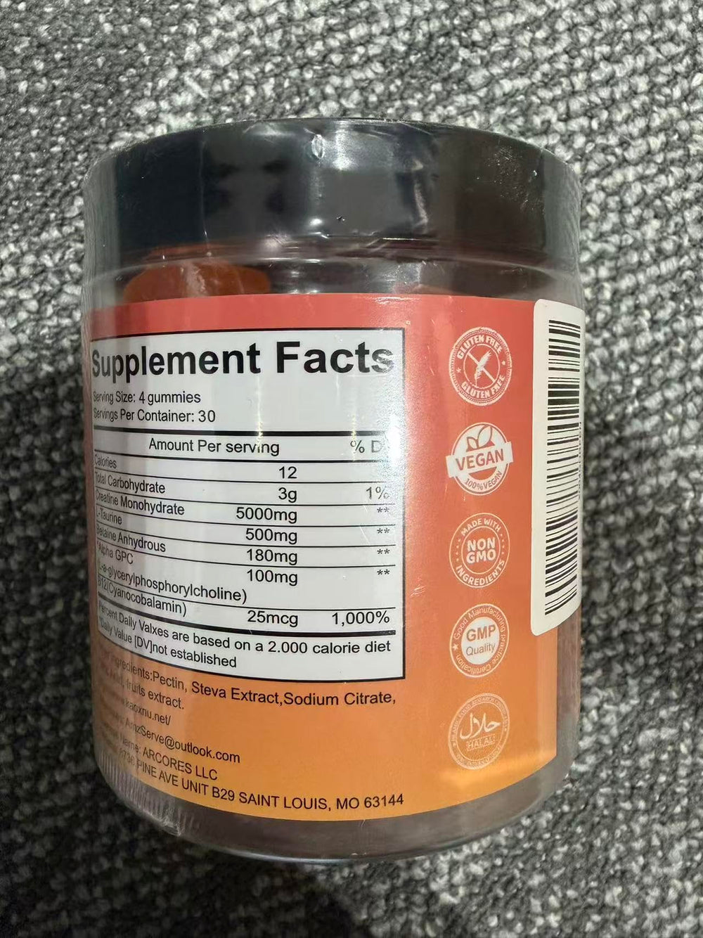 Close-up of KAOXNU label highlighting vegan and sugar-free features.