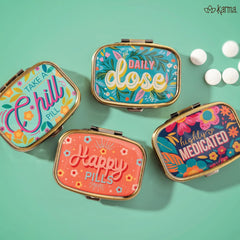 Karma travel pill case in use during travel, keeping pills organized.