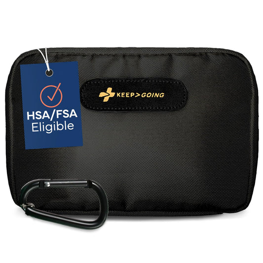 KeepGoing travel first aid kit open in car, organized for quick access.