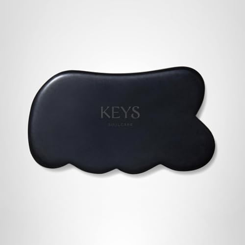 Keys Soulcare Obsidian Stone Gua Sha Tool ritual use for a spa-like self-care moment.