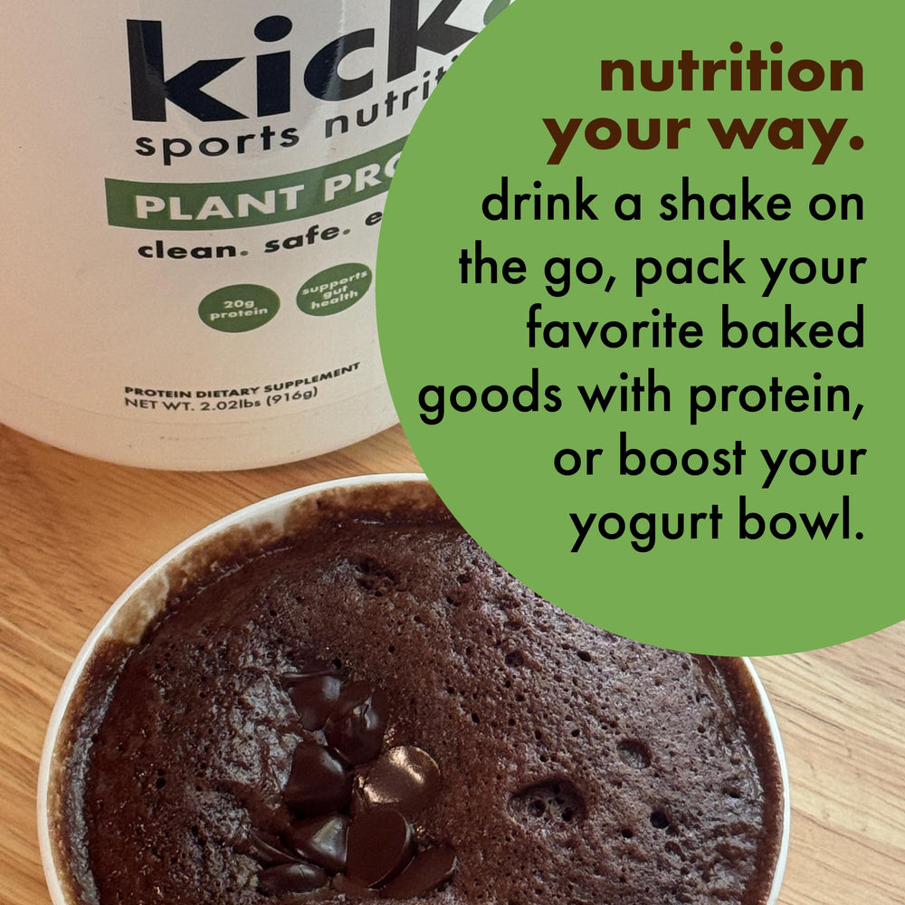 Kick Plant Protein Powder chocolate glass with creamy shake ready to sip.