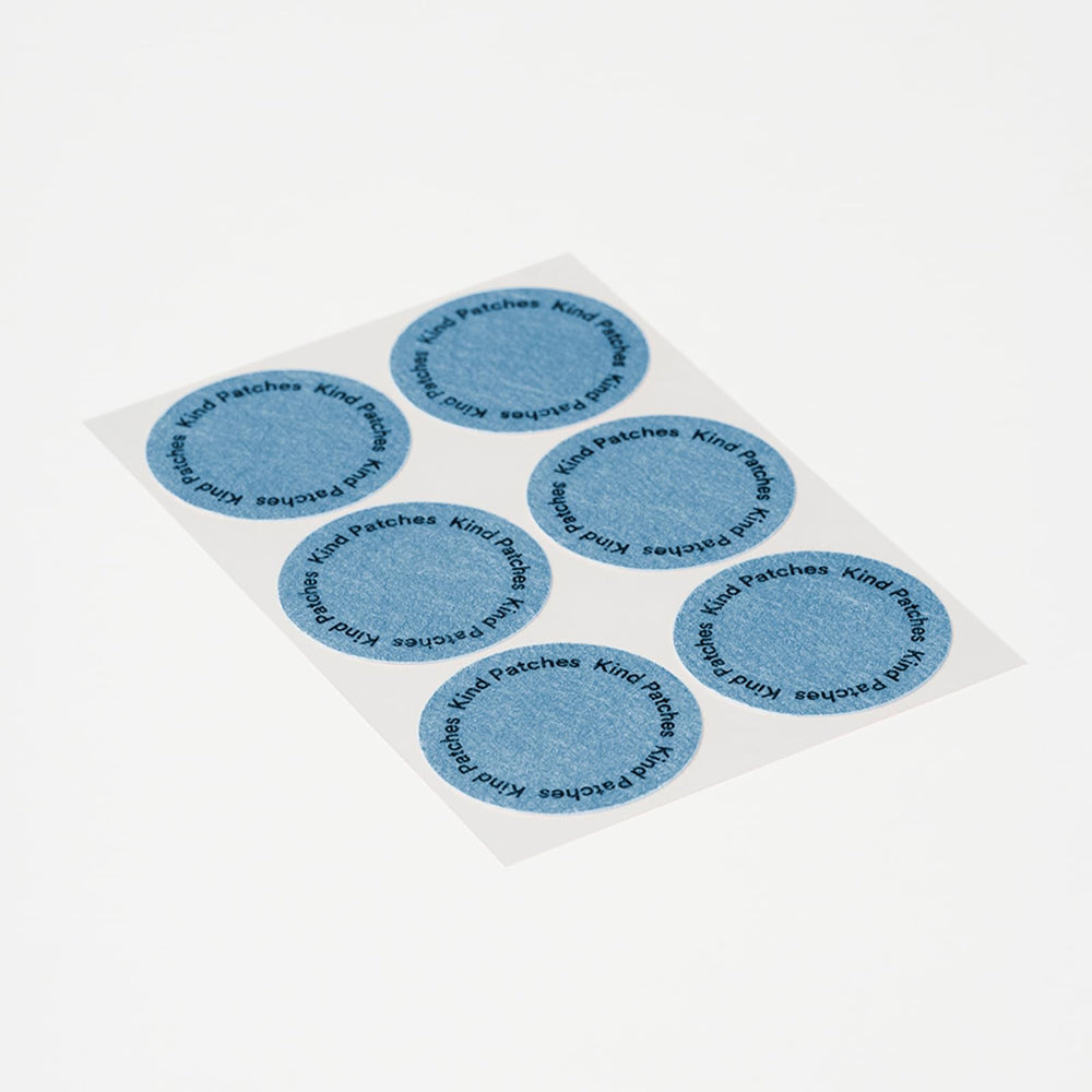 Kind Patches Melatonin Dream patch in a dark room suggests uninterrupted rest.