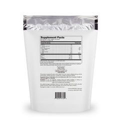Scoop of Klean Isolate powder ready to mix into beverages
