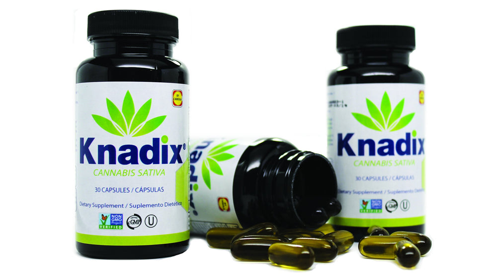 Knadix hemp oil supplement label closeup emphasizes cold-pressed organic hemp seed oil.