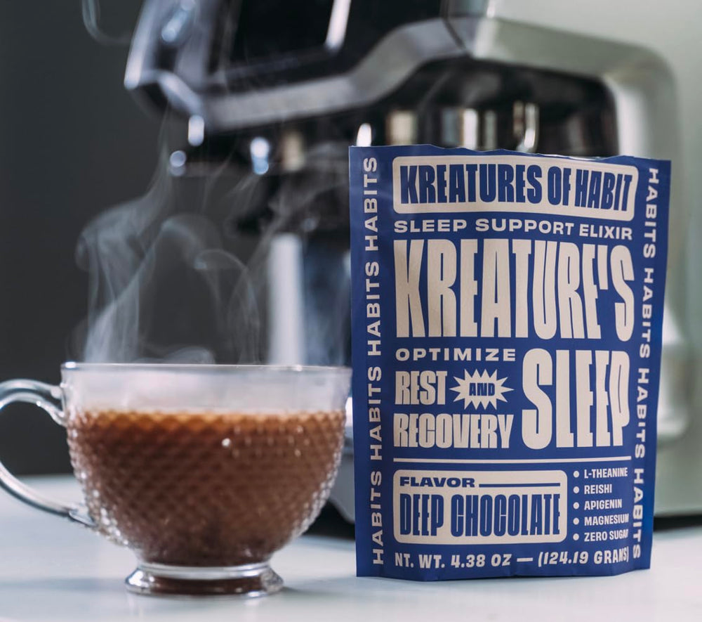 Kreatures of Habit Sleep chocolate powder dissolving in warm milk.