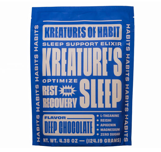 Kreatures of Habit Sleep chocolate powder being poured for a sugar-free relaxing evening ritual.