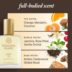 Kuumba Made Golden Sky roll-on on wrist for on-the-go fragrance
