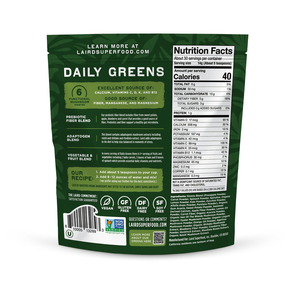 Laird Superfood Daily Greens spoon scooping powder into glass