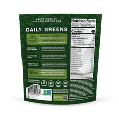 Laird Superfood Daily Greens spoon scooping powder into glass