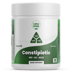 Layer Origin Constipiotic bottle pouring powder into a glass for easy daily use.