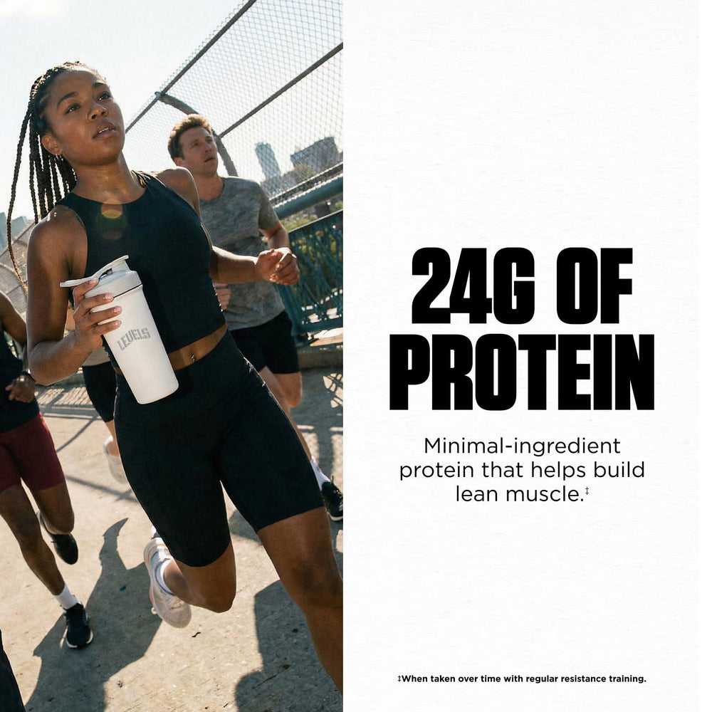 Levels Whey protein mixing into mug for a smooth shake.