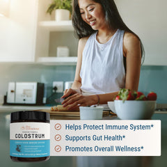 Live Conscious colostrum powder measuring spoon with clear dosage.