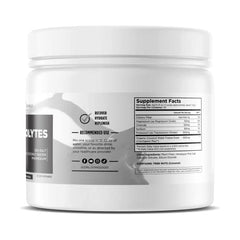 Livingood Daily Electrolytes scoop dissolving in water for easy hydration
