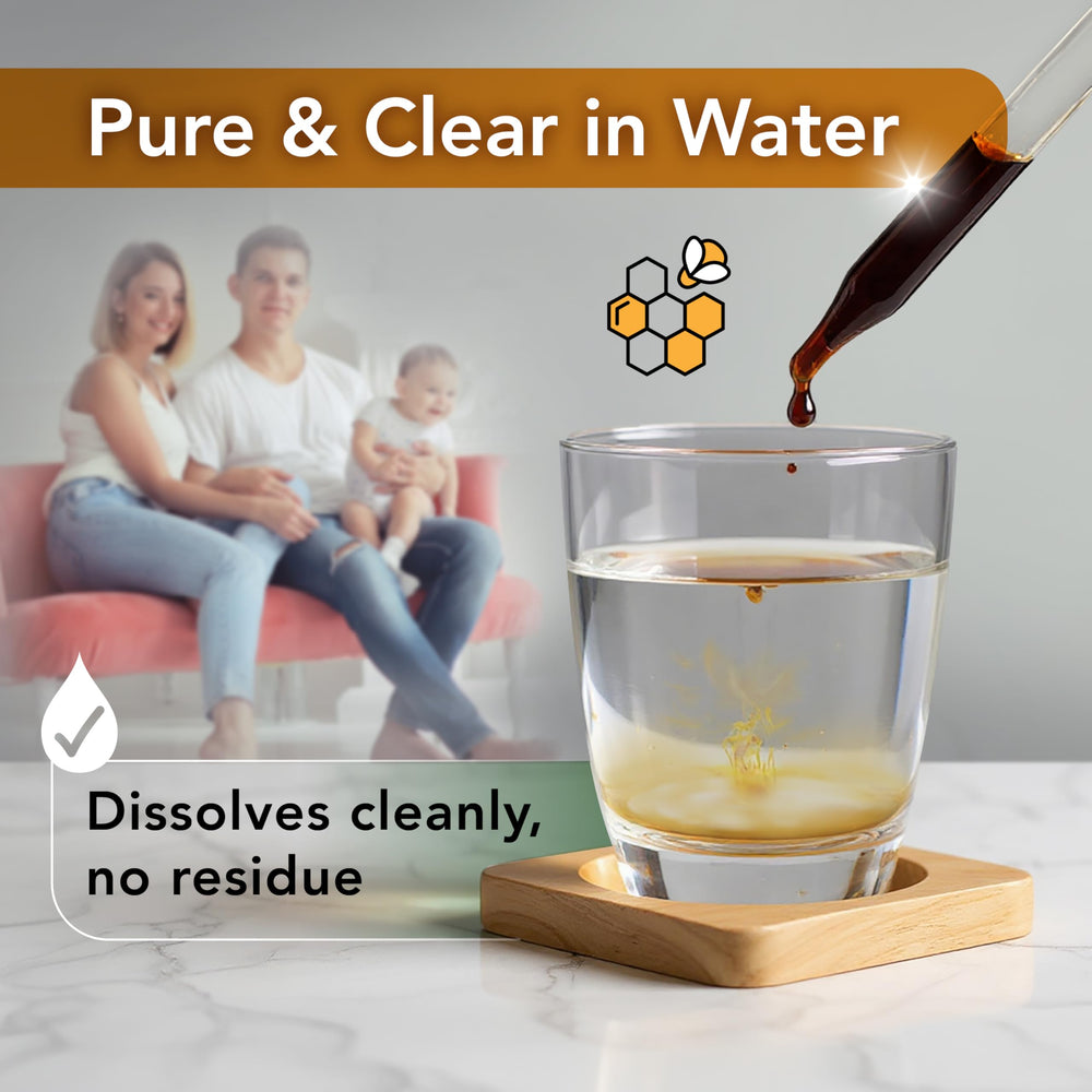 LOVITA propolis bottle with glass of water ready to blend into beverages