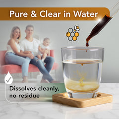 LOVITA propolis bottle with glass of water ready to blend into beverages